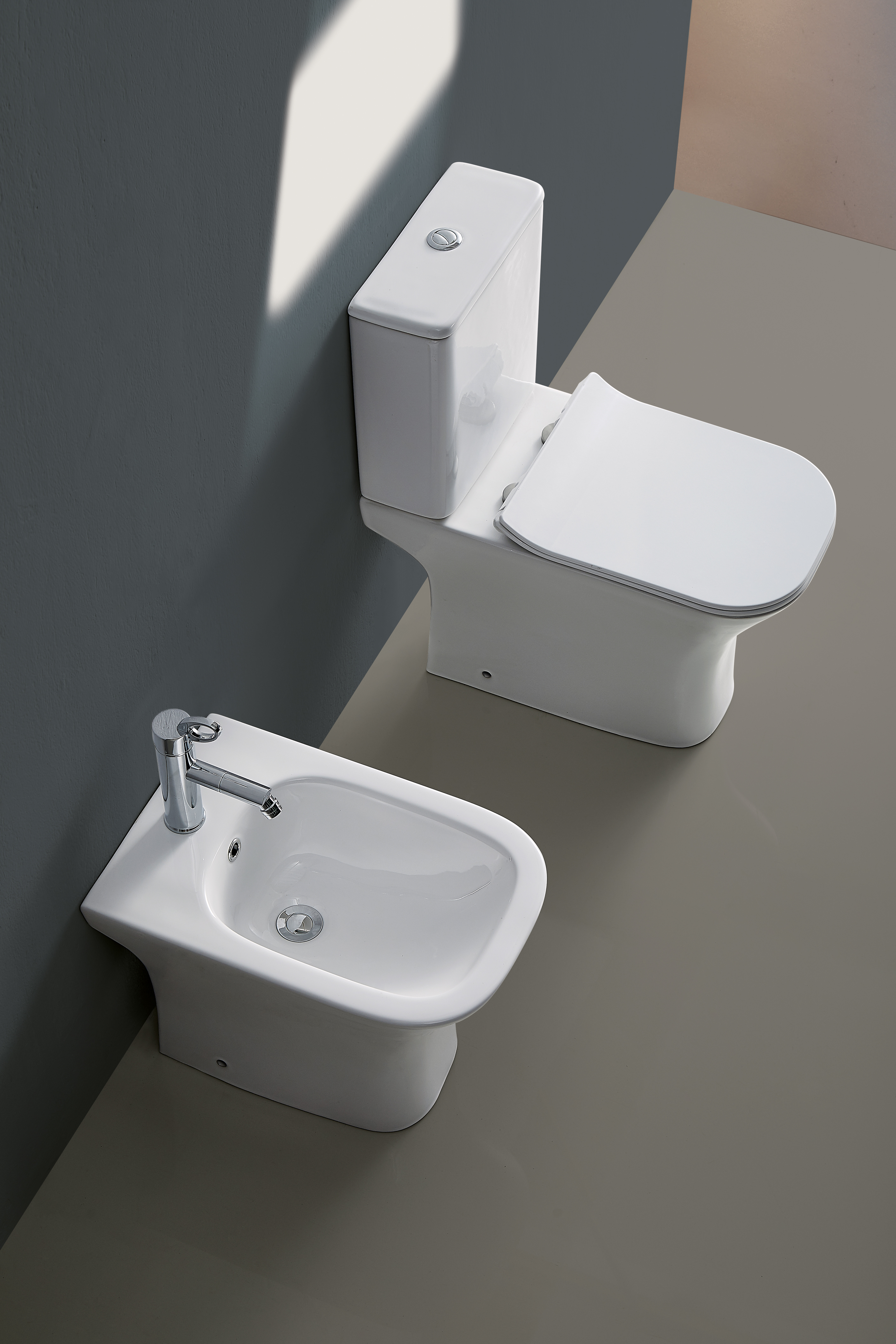 картинка Биде напольное Azario FRETTA SQUARE 34х52.5х40 фаянс (AZ1215C) от магазина Сантехника.SpecialFlat